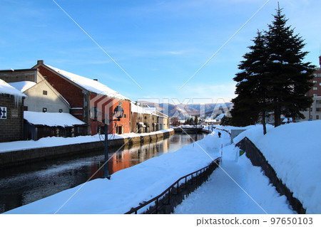 At the Otaru Canal in sunny winter (Otaru City, Hokkaido) 97650103