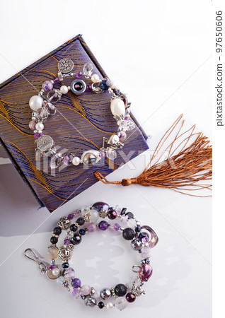 stylish jewelry semiprecious bracelets with present box around white background. hobby and fashion concept. stylish jewelry semiprecious bracelets with present box around white background. hobby and fashion concept. 97650606