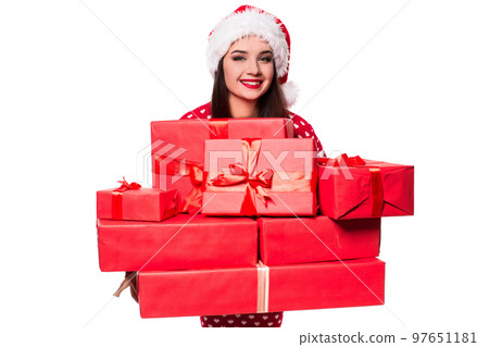 A beautiful young female overjoyed, holding many gifts in her hands A beautiful young female overjoyed, holding many gifts in her hands 97651181