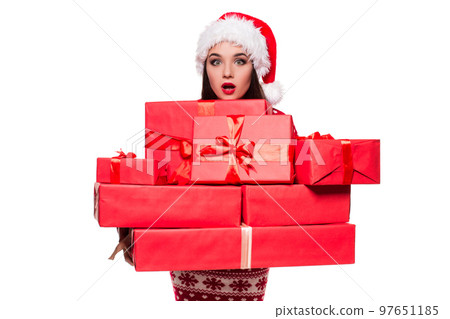 A beautiful young female overjoyed, holding many gifts in her hands A beautiful young female overjoyed, holding many gifts in her hands 97651185