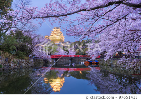 Himeji, Japan at Himeji Castle's Surrounding Moat in the Spring Season. Himeji, Japan at Himeji Castle's Surrounding Moat in the Spring Season. 97651413