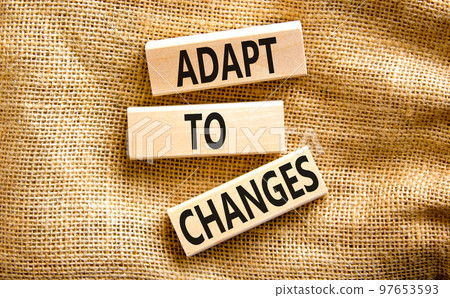 Adapt to changes symbol. Concept words Adapt to changes on wooden blocks on canvas. Beautiful canvas background. Business and Adapt to changes quote concept. Copy space. Adapt to changes symbol. Concept words Adapt to changes on wooden blocks on canvas. Beautiful canvas background. Business and Adapt to changes quote concept. Copy space. 97653593