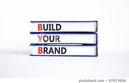 BYB build your brand symbol. Concept words BYB build your brand on books on a beautiful white table white background. Business and BYB build your brand concept. Copy space. BYB build your brand symbol. Concept words BYB build your brand on books on a beautiful white table white background. Business and BYB build your brand concept. Copy space. 97653606