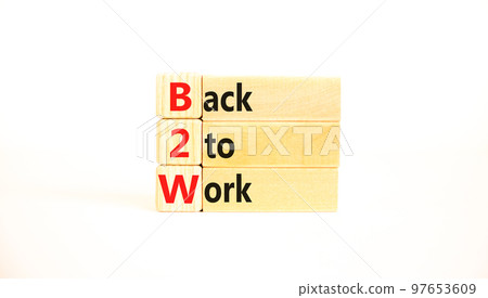 B2W back to work symbol. Concept words B2W back to work on wooden blocks on a beautiful white table white background. Business and B2W back to work concept. Copy space. B2W back to work symbol. Concept words B2W back to work on wooden blocks on a beautiful white table white background. Business and B2W back to work concept. Copy space. 97653609