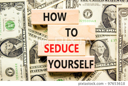 How to seduce yourself symbol. Concept word How to seduce yourself on wooden blocks. Beautiful background from dollar bills. Business and how to seduce yourself concept. Copy space. How to seduce yourself symbol. Concept word How to seduce yourself on wooden blocks. Beautiful background from dollar bills. Business and how to seduce yourself concept. Copy space. 97653618