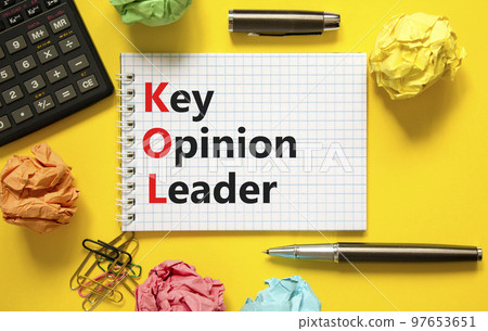 KOL key opinion leader symbol. Concept words KOL key opinion leader on white note on a beautiful yellow background. Calculator. Business KOL key opinion leader concept. Copy space. 97653651