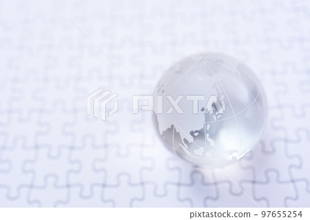 Globe on jigsaw puzzle last piece focus Japan Korea bright 97655254