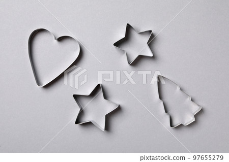 Concept of cooking tools, cookie cutters, top view Concept of cooking tools, cookie cutters, top view 97655279