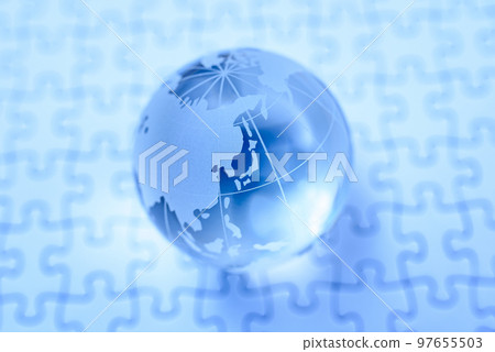 Globe on jigsaw puzzle blue 97655503