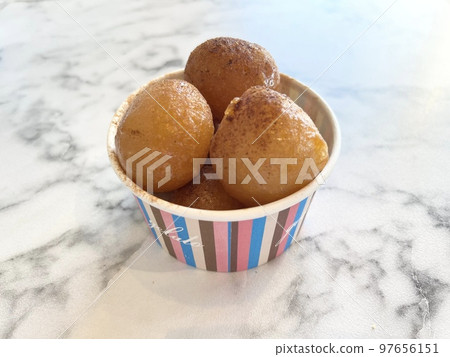 Lucumades, a traditional Greek donut 97656151