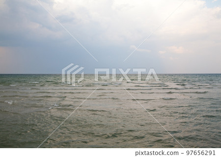 Seascape. Sky and clouds over the sea. Seascape. Sky and clouds over the sea. 97656291