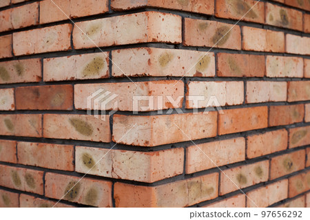 The corner of the brick building 97656292