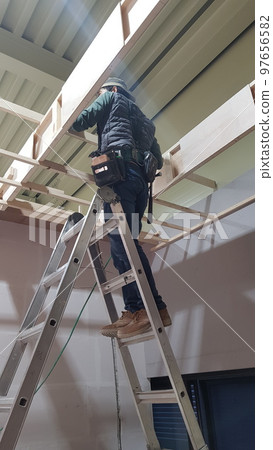 Carpenter, carpentry, wood, ceiling, gypsum board, finishing Carpenter, carpentry, wood, ceiling, gypsum board, finishing 97656582