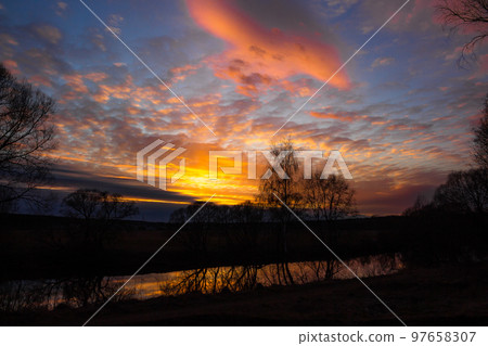 Colorful multicolor sunset over the river Colorful multicolor sunset over the river 97658307