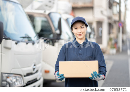 Young female worker in delivery industry 97658771