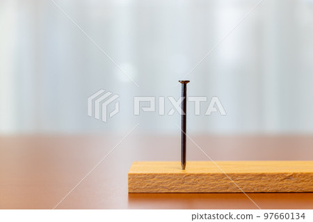 wood and iron nails 97660134