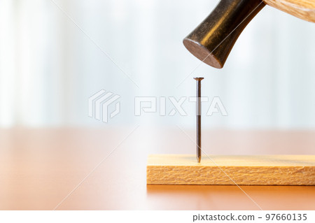 hammer a nail hammer a nail 97660135