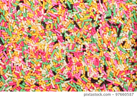Colorful chocolate spray close-up 97660587