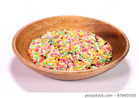 Colorful chocolate spray served on a plate 97660588