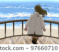 看美麗的冬天海的婦女 97660710