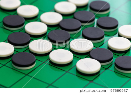 Othello black and white stones 97660987