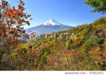 Mt.Mitsutoge to Mt.Fuji and autumnal trees on the ridge Mt.Mitsutoge to Mt.Fuji and autumnal trees on the ridge 97662972