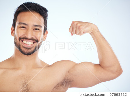 Portrait, fitness or man in studio to flex muscle or strong arms training biceps in workout or exercise. Face, happy smile or healthy bodybuilder with growth mindset, motivation or wellness goals Portrait, fitness or man in studio to flex muscle or strong arms training biceps in workout or exercise. Face, happy smile or healthy bodybuilder with growth mindset, motivation or wellness goals 97663512