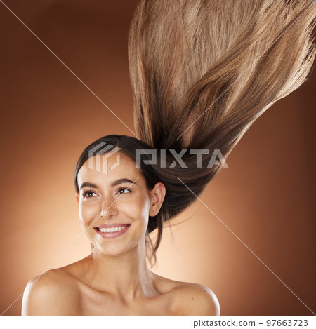 Hair, beauty and skincare with a model woman in studio on a brown background for natural or keratin treatment. Face, haircare and salon with an attractive young female posing to promote a product Hair, beauty and skincare with a model woman in studio on a brown background for natural or keratin treatment. Face, haircare and salon with an attractive young female posing to promote a product 97663723