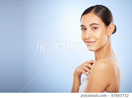 Portrait, skincare and beauty with a model woman in studio on a gray background for natural treatment. Face, wellness and luxury with an attractive young female posing to promote a skin care product 97663732