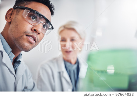 Face, doctors and beaker in laboratory for research, testing and analysis. Science, innovation and teamwork of man, senior woman and researchers with goggles looking at glass flask for experiment. 97664028