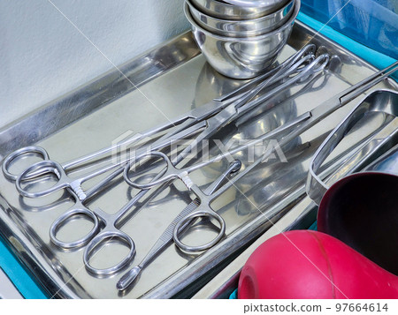 Surgical instruments in the preparation tray of the operating room Surgical instruments in the preparation tray of the operating room 97664614