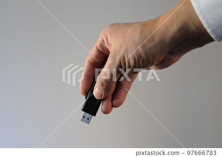 male hand with usb memory male hand with usb memory 97666783