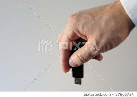 male hand with usb memory male hand with usb memory 97666784