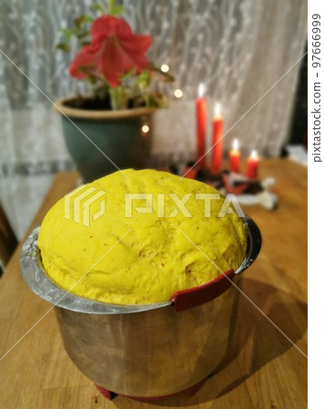 Saffron bun on kitchen background 97666999