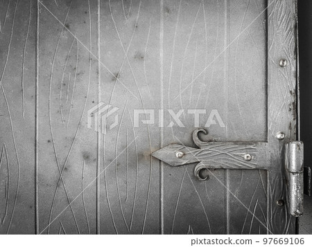 close up.rusty latch on a wooden door 97669106