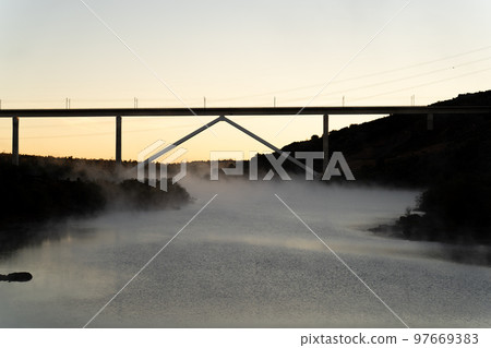 Modern bridge for high speed train early in the morning Modern bridge for high speed train early in the morning 97669383