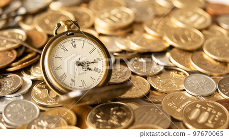 Pocket watch and coins Time is money 97670065