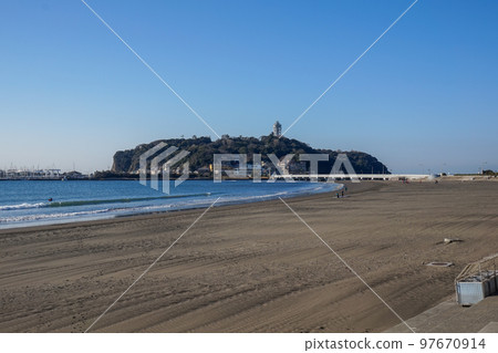 Enoshima seen from Koshigoe Beach in the early morning Enoshima seen from Koshigoe Beach in the early morning 97670914