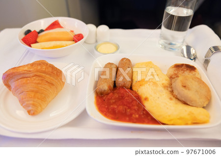 Delicious omelet breakfast in business class Delicious omelet breakfast in business class 97671006