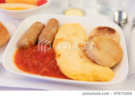 Delicious omelet breakfast in business class 97671008