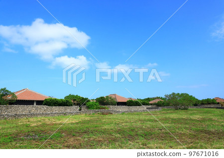 Taketomi Island: Houses with red tiled roofs Taketomi Island: Houses with red tiled roofs 97671016