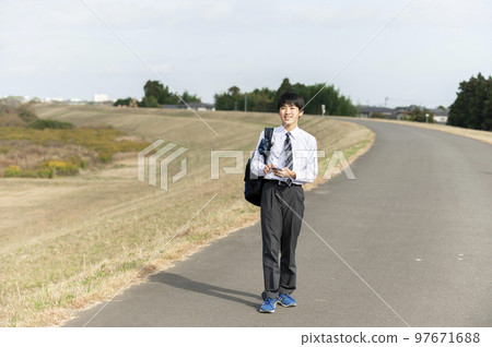 junior high school student with smartphone 97671688