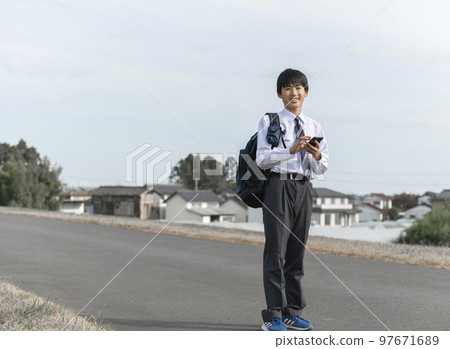 junior high school student with smartphone 97671689