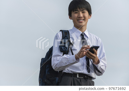 junior high school student with smartphone junior high school student with smartphone 97671692