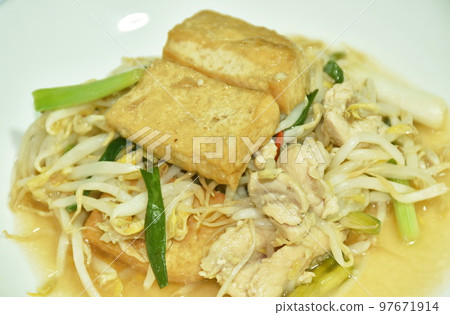 fried bean sprout with slice yellow tofu vegetarian food on plate 97671914