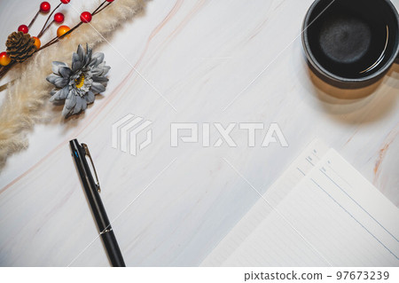Marble background and interior cups and writing utensils Marble background and interior cups and writing utensils 97673239