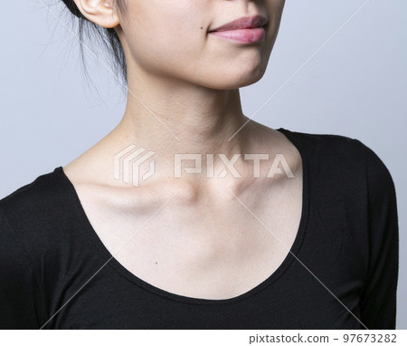 A woman with her neckline wide open A woman with her neckline wide open A woman with no wrinkles on her décolletage A woman taking care of her décolletage A woman with her neckline wide open A woman with her neckline wide open A woman with no wrinkles on her décolletage A woman taking care of her décolletage 97673282