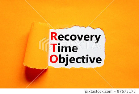 RTO recovery time objective symbol. Concept words RTO recovery time objective on white paper on a beautiful orange background. Business and RTO recovery time objective concept. Copy space. 97675173