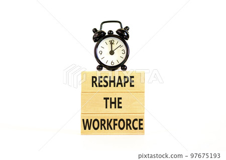 Reshape the workforce and support symbol. Concept words Reshape the workforce on blocks. Black alarm clock. Beautiful white table white background. Business reshape the workforce concept. Copy space Reshape the workforce and support symbol. Concept words Reshape the workforce on blocks. Black alarm clock. Beautiful white table white background. Business reshape the workforce concept. Copy space 97675193