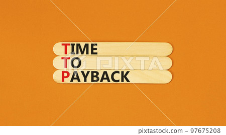 TTP time to payback symbol. Concept words TTP time to payback on wooden sticks on beautiful orange table orange background. Business TTP time to payback concept. Copy space. 97675208